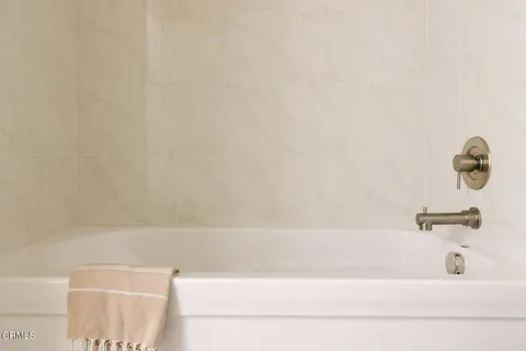 a bathroom with a bathtub