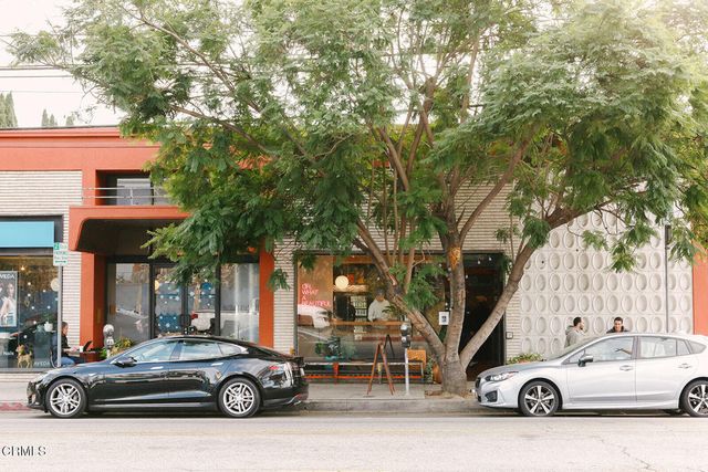 a car parked in front of a house