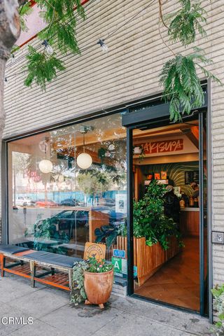 a outdoor living space with plants and furniture