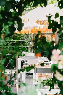 a view of yard with patio