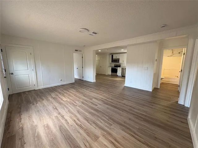 a view of an empty room and window