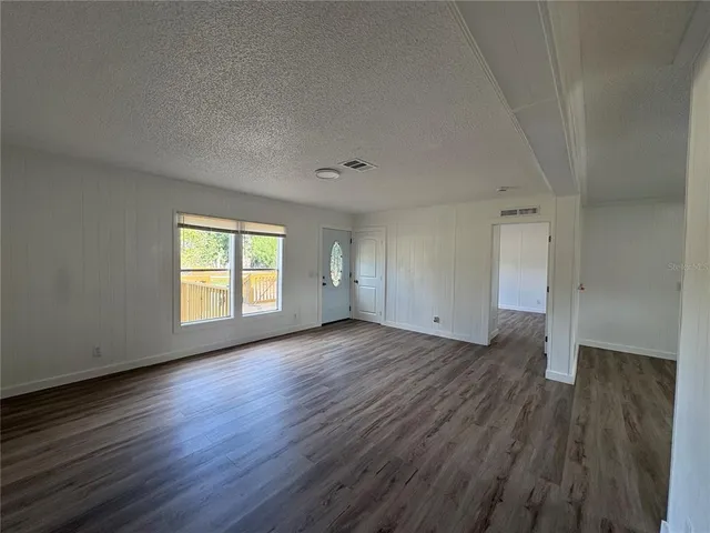 a view of a storage & utility room in wooden floor