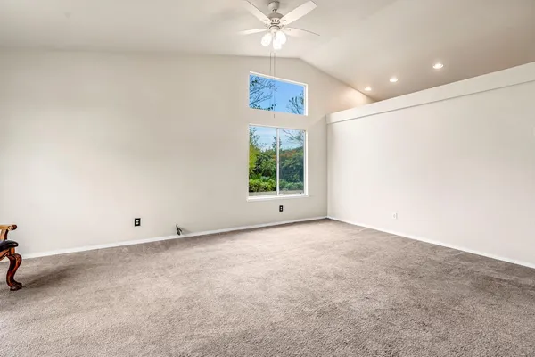 a view of a livingroom with furniture and a chandelier
