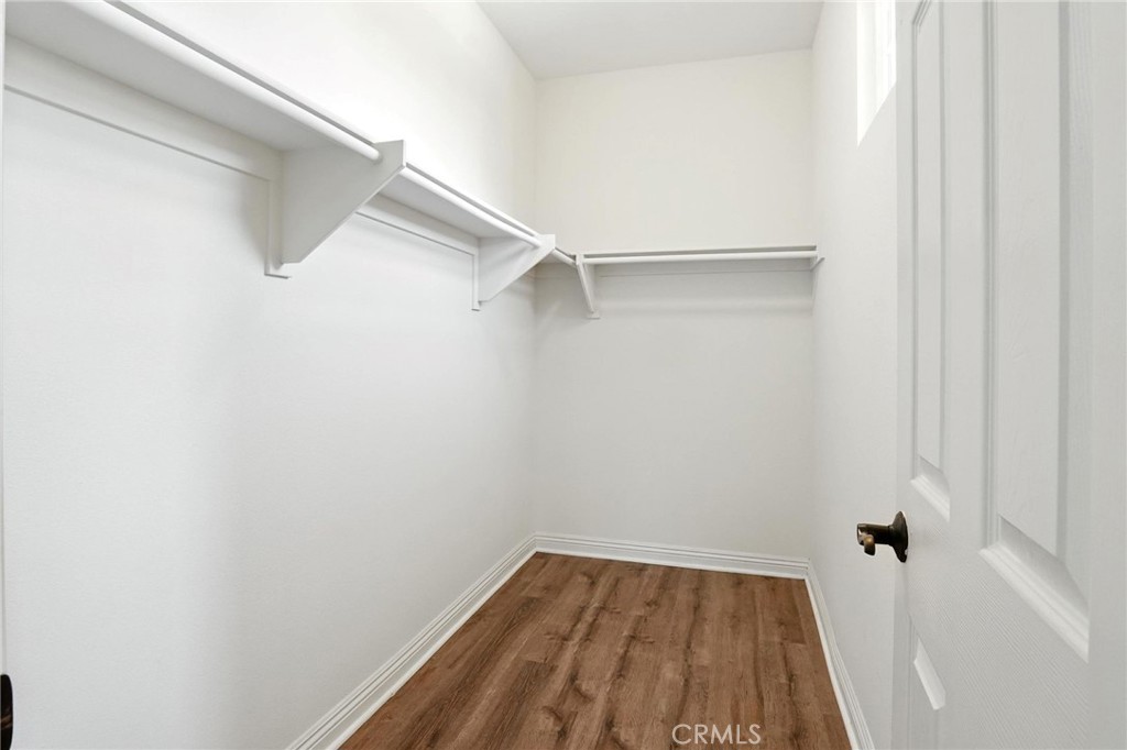 18338 Lakepointe Drive Riverside, CA 92503 - Photo 28 of 40 a view of a room with racks on the wall