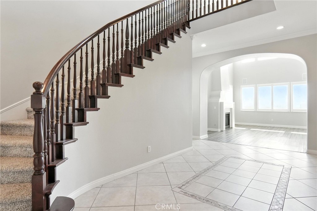 18338 Lakepointe Drive Riverside, CA 92503 - Photo 4 of 40 a view of an entryway with wooden floor