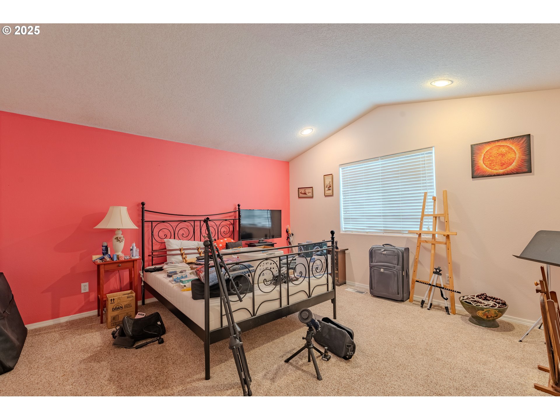 13307 Northeast 77th Street Vancouver, WA 98682 - Photo 14 of 33 a living room with furniture a flat screen tv and gym equipment