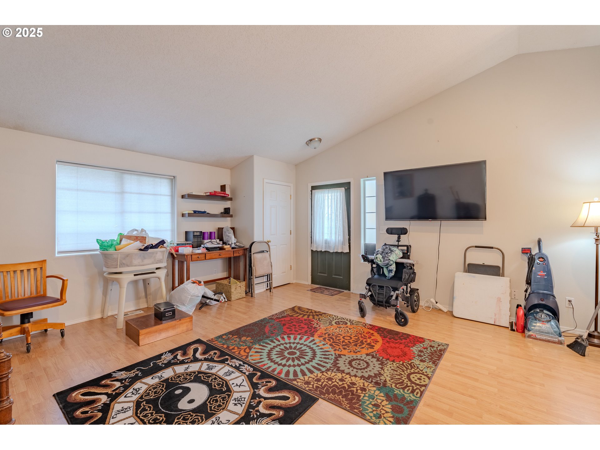 13307 Northeast 77th Street Vancouver, WA 98682 - Photo 3 of 33 a living room with furniture and a flat screen tv