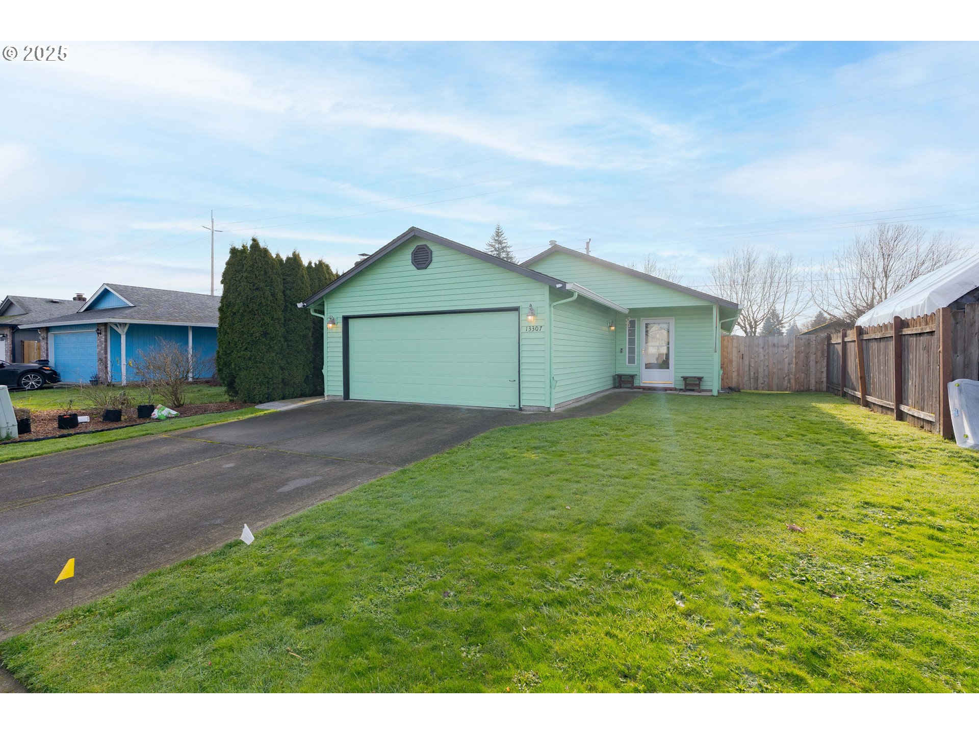 13307 Northeast 77th Street Vancouver, WA 98682 - Photo 33 of 33 a front view of a house with a garden and yard