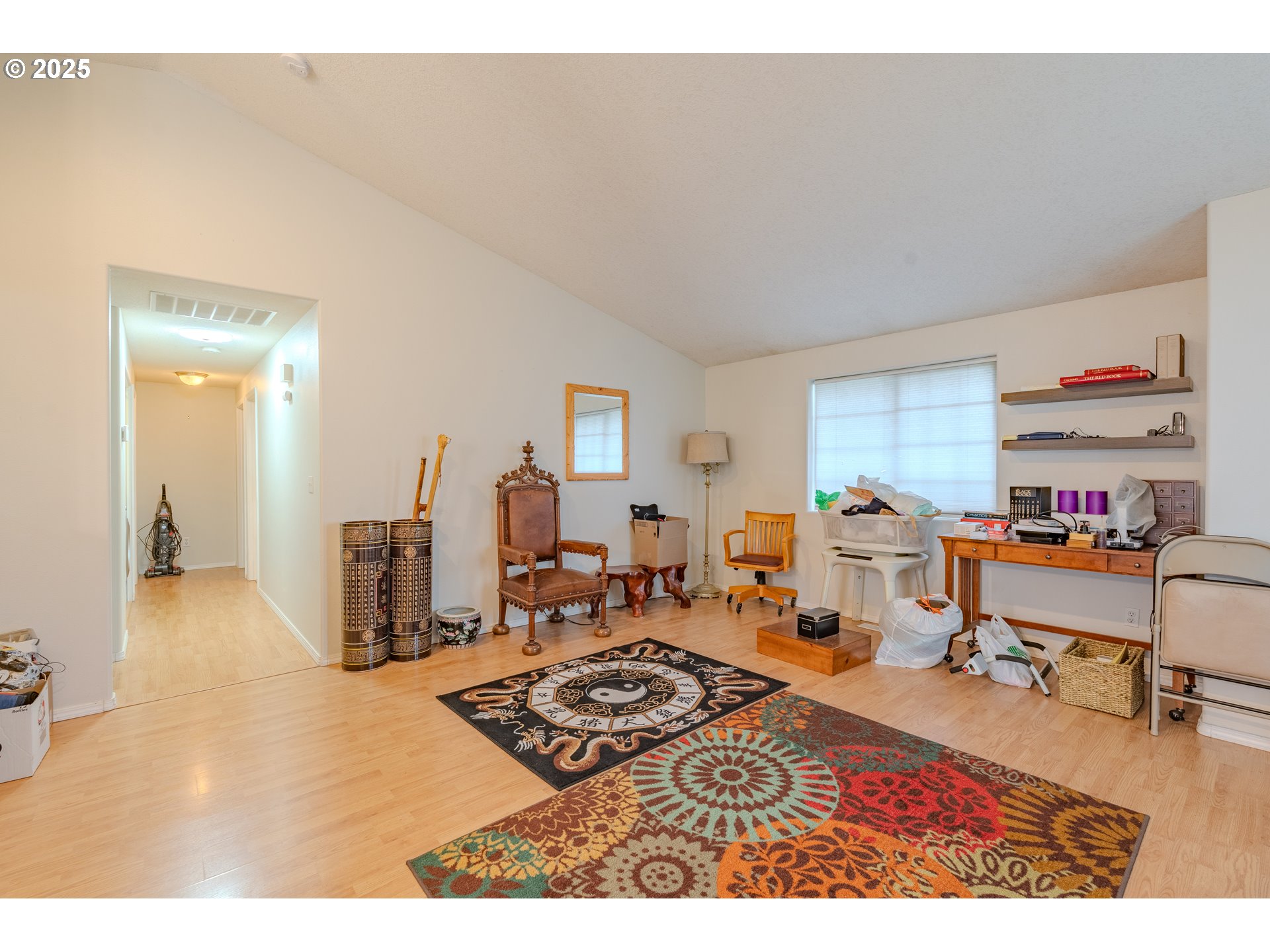 13307 Northeast 77th Street Vancouver, WA 98682 - Photo 4 of 33 a living room with furniture and a wooden floor
