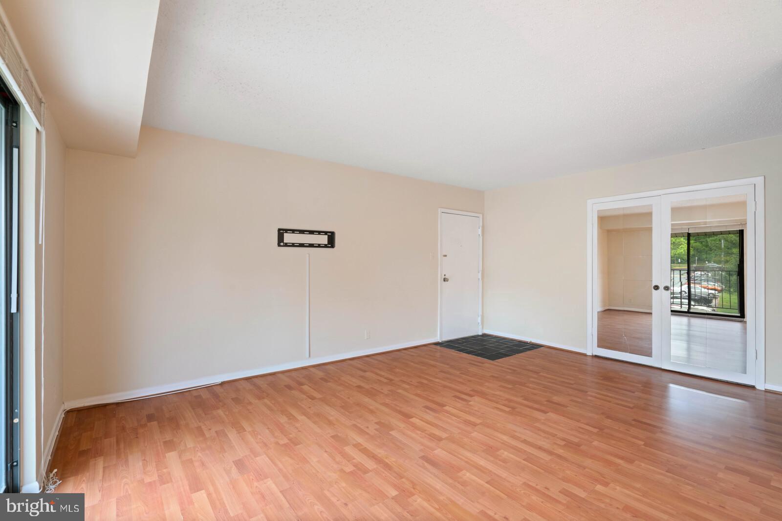 6260 Edsall Road, Unit 404 Alexandria, VA 22312 - Photo 7 of 28 Living room with large closet