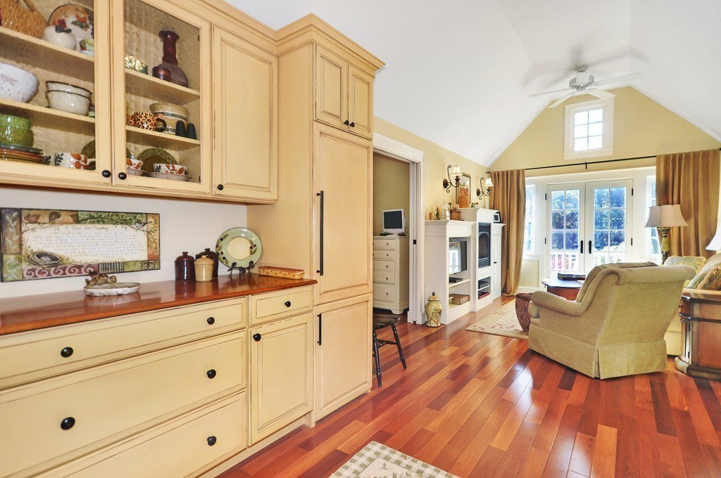 315 Garfield Road Concord, MA 01742 - Photo 18 of 21 a living room with furniture and a floor to ceiling window