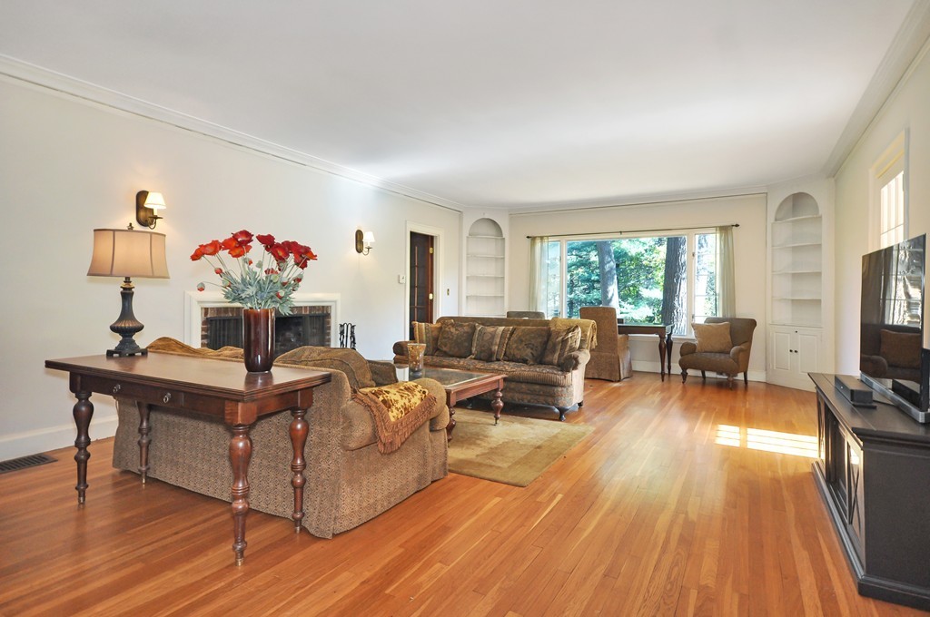 315 Garfield Road Concord, MA 01742 - Photo 4 of 21 a living room with furniture and a flat screen tv