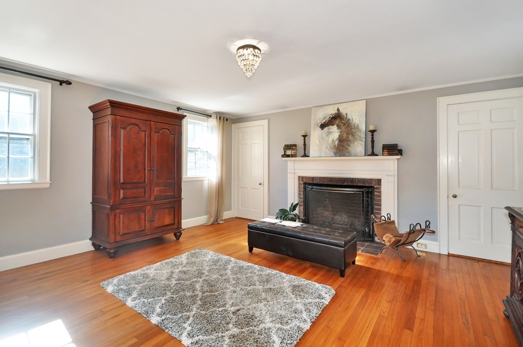 315 Garfield Road Concord, MA 01742 - Photo 5 of 21 a living room with furniture and a fireplace