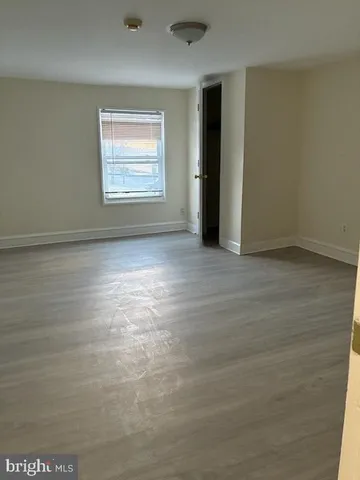 an empty room with window
