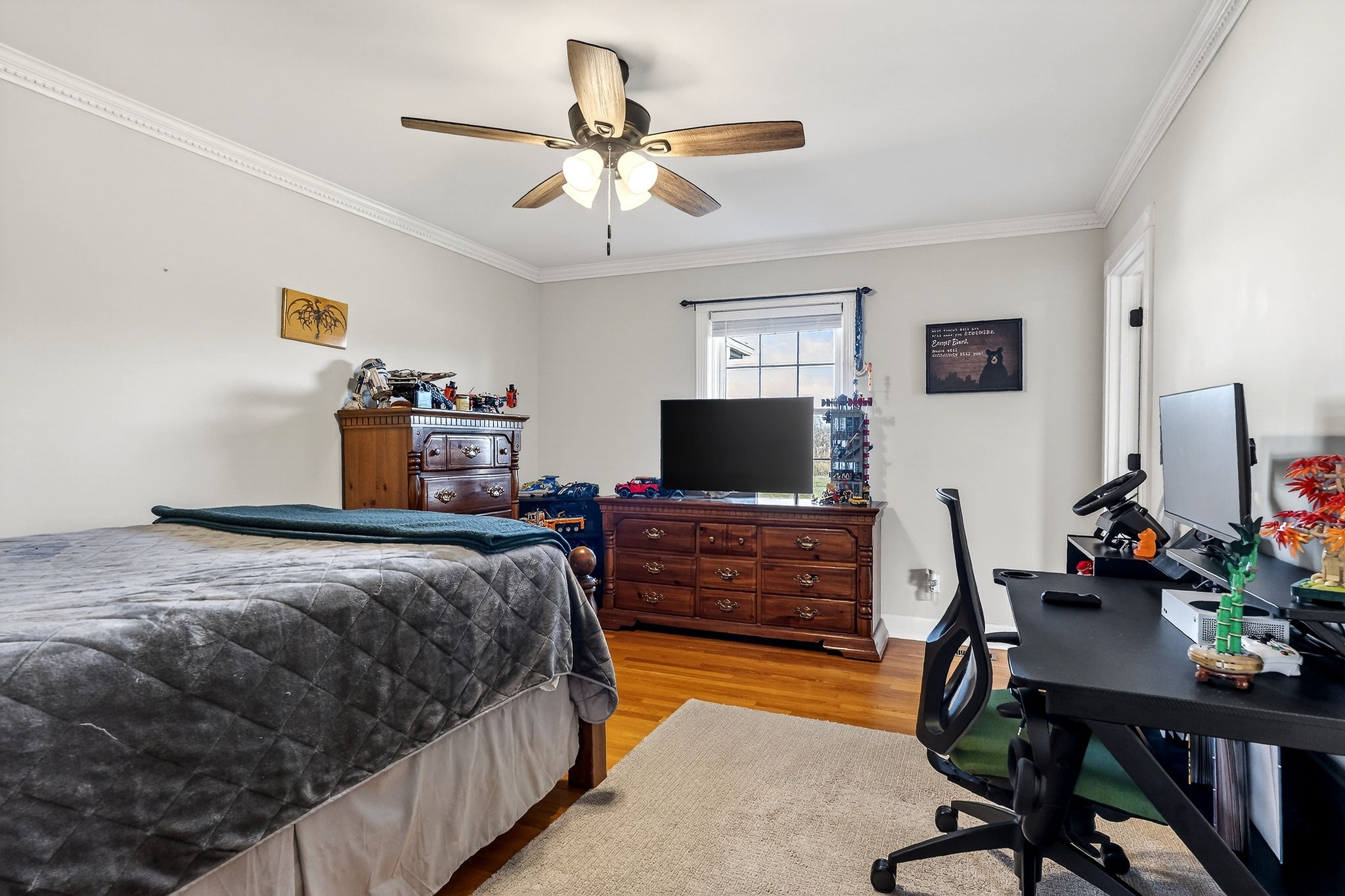 597 Game Ridge Road Smithville, TN 37166 - Photo 26 of 45 a bedroom with bed tv and window