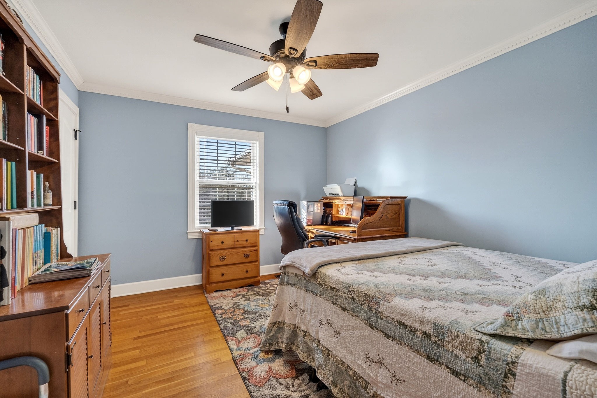 597 Game Ridge Road Smithville, TN 37166 - Photo 31 of 45 a bedroom with a bed and furniture