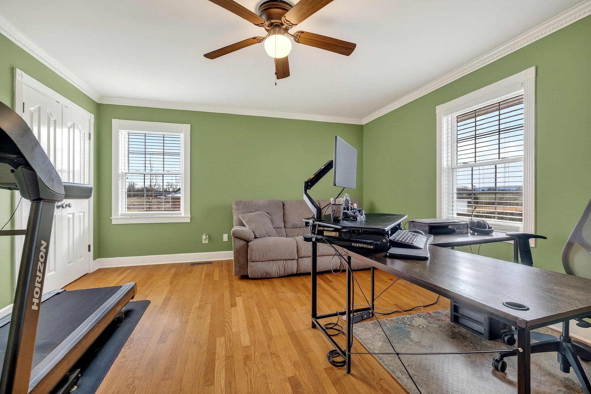 597 Game Ridge Road Smithville, TN 37166 - Photo 34 of 45 a living room with furniture a flat screen tv and a large window