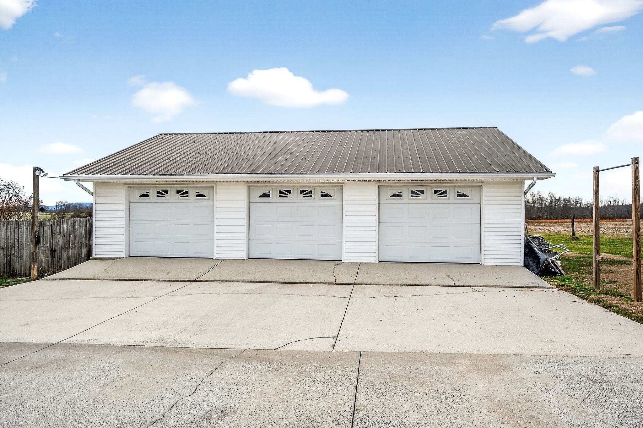 597 Game Ridge Road Smithville, TN 37166 - Photo 42 of 45 a front view of a house with a garage
