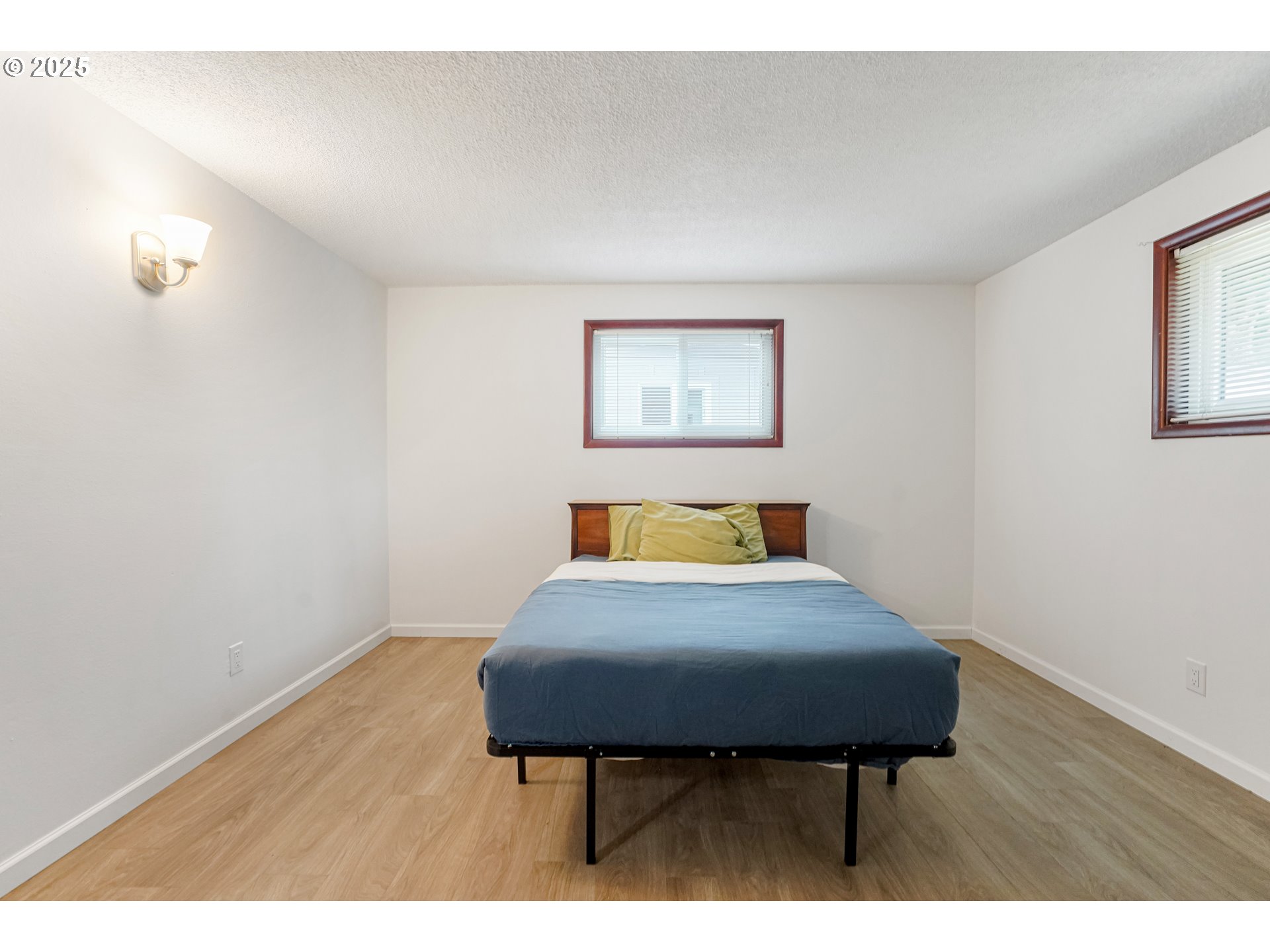 4627 2nd Way Southeast Salem, OR 97302 - Photo 16 of 48 a bedroom with a bed and a table in it