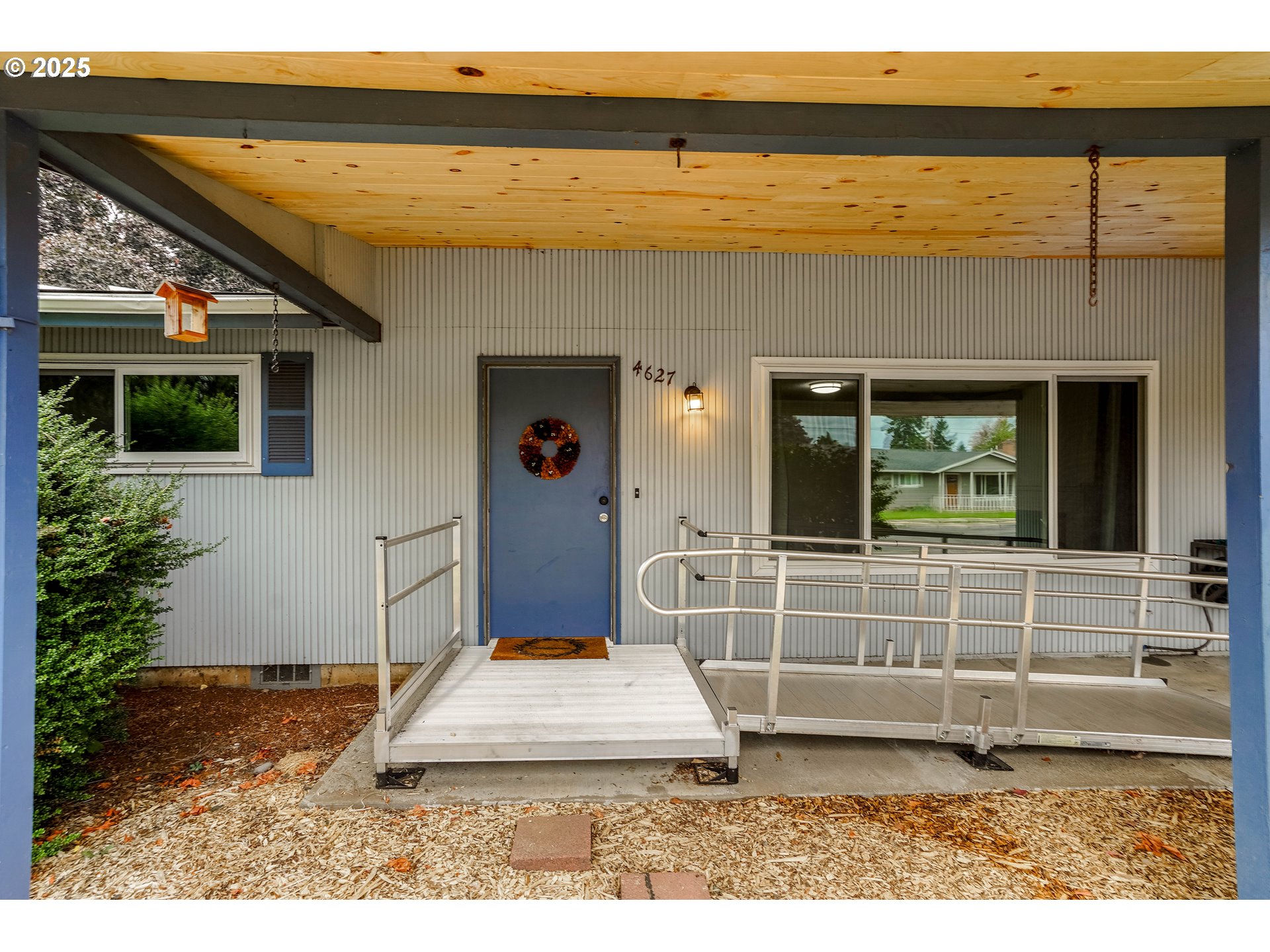 4627 2nd Way Southeast Salem, OR 97302 - Photo 4 of 48 a view of front door and potted plants