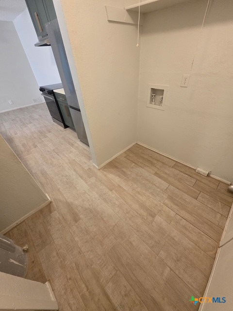 2010 South 15th Street, Unit B Temple, TX 76504 - Photo 6 of 12 a view of a room with white walls and stairs