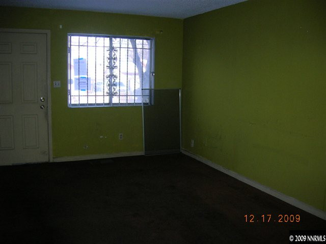 1402 East 9th Street, Unit 8 Reno, NV 89512 - Photo 3 of 9 a view of a room that has a window in it