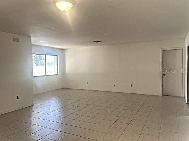 12 Pine Course Way Ocala, FL 34472 - Photo 8 of 29 an empty room with windows
