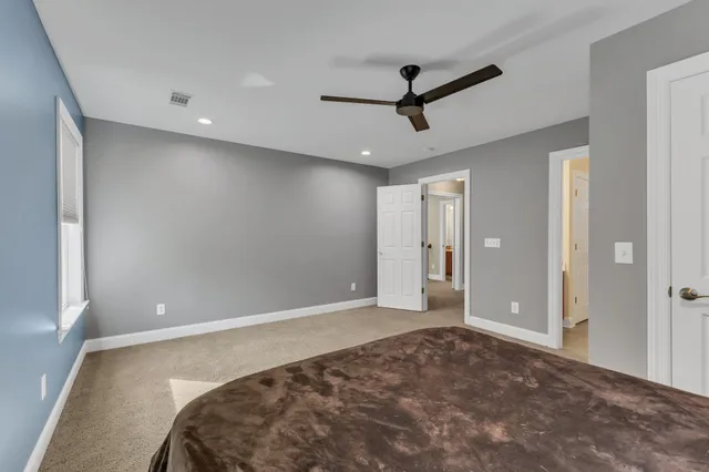 a bathroom with a sink vanity and mirror