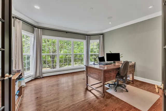 a workspace with furniture and a window