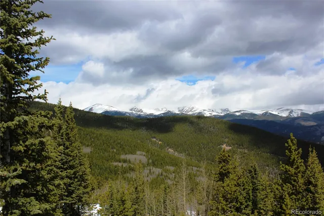 a view of a lake with a mountain in the background