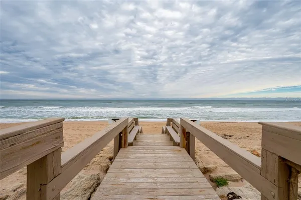 a view of building with an outdoor space and seating