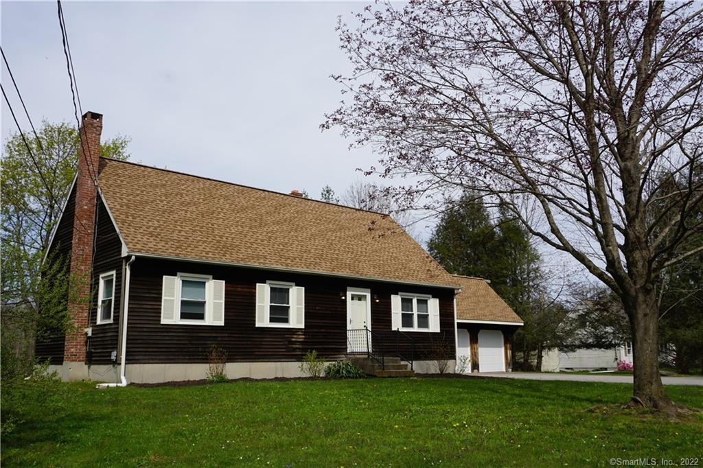 74 Maple Road Mansfield, CT 06268 - Photo 1 of 1 a front view of house with yard and green space