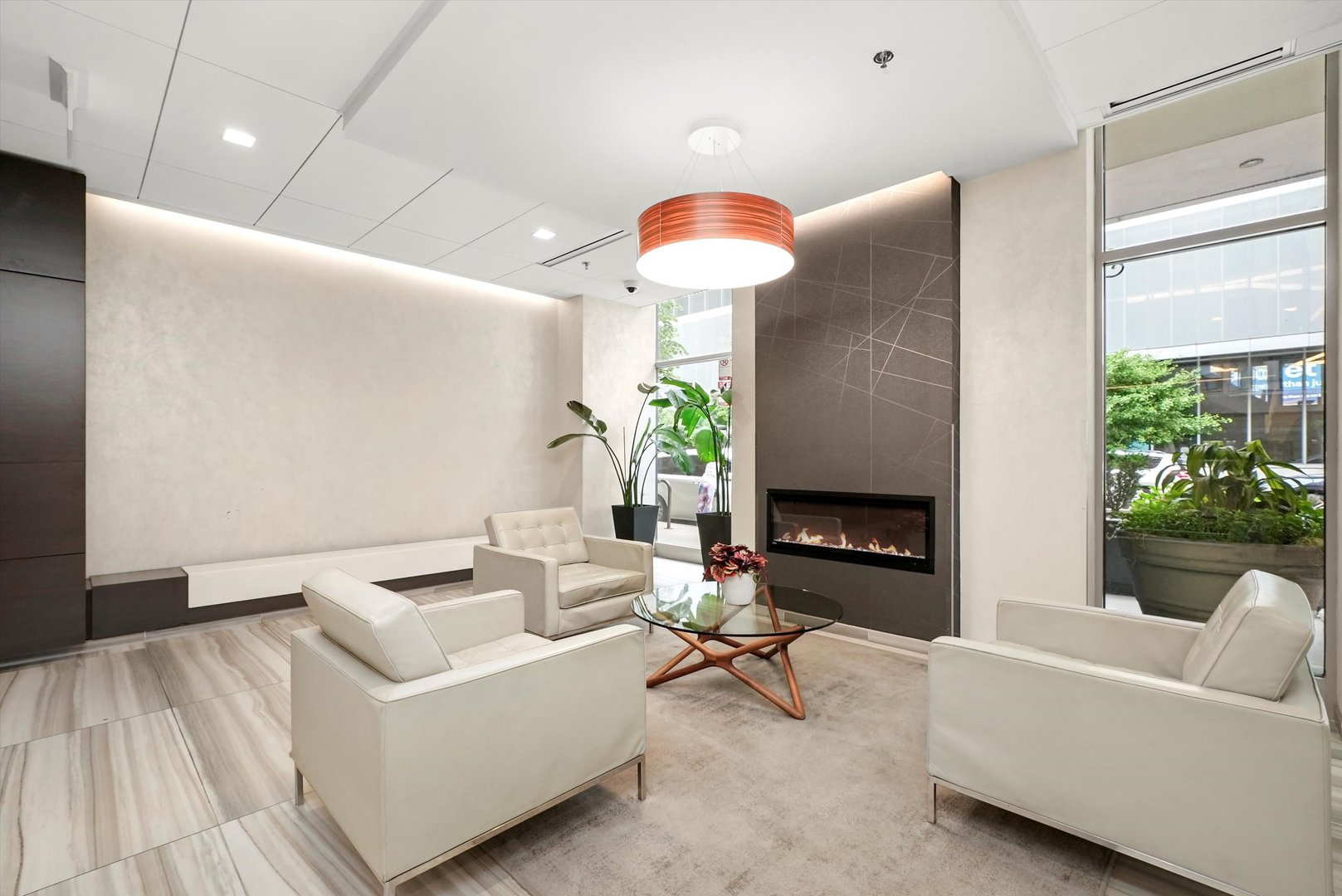 41 East 8th Street, Unit 1404 Chicago, IL 60605 - Photo 22 of 26 a living room with furniture and a fireplace