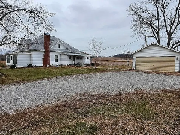 a view of large house with a yard