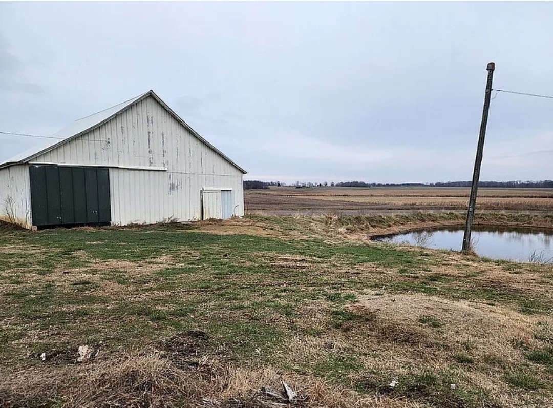1100 John Stelle Road McLeansboro, IL 62859 - Photo 7 of 20 a view of a house with a yard