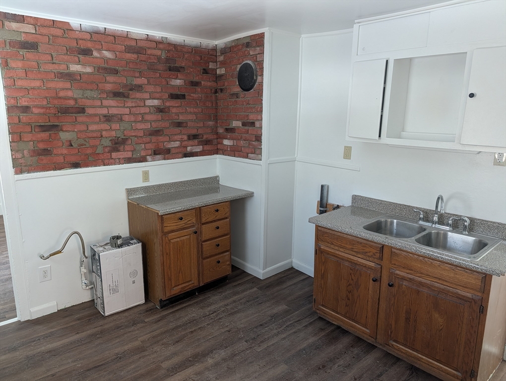 9 Turnpike Road, Unit 2 Montague, MA 01376 - Photo 12 of 21 a kitchen with a sink and cabinets