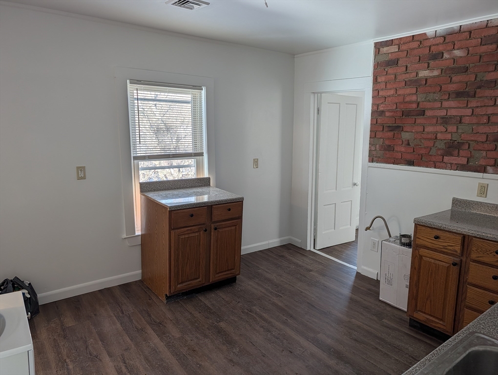 9 Turnpike Road, Unit 2 Montague, MA 01376 - Photo 14 of 21 a room with a wooden floor and a sink