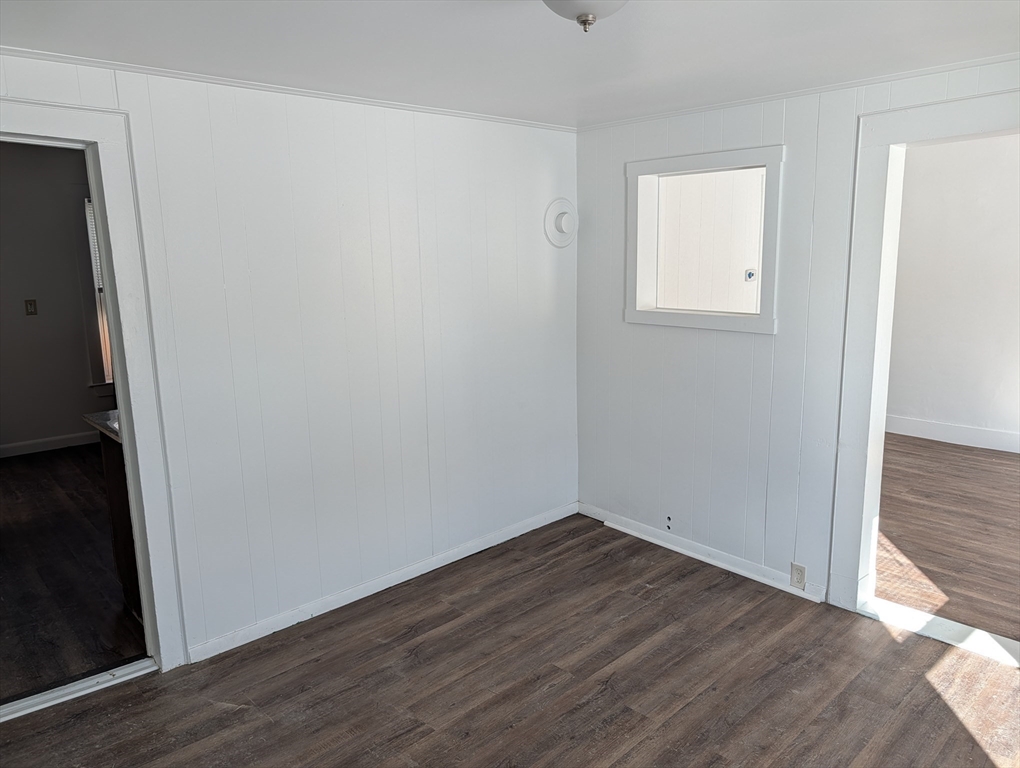 9 Turnpike Road, Unit 2 Montague, MA 01376 - Photo 18 of 21 a view of a small space with wooden floor and a window