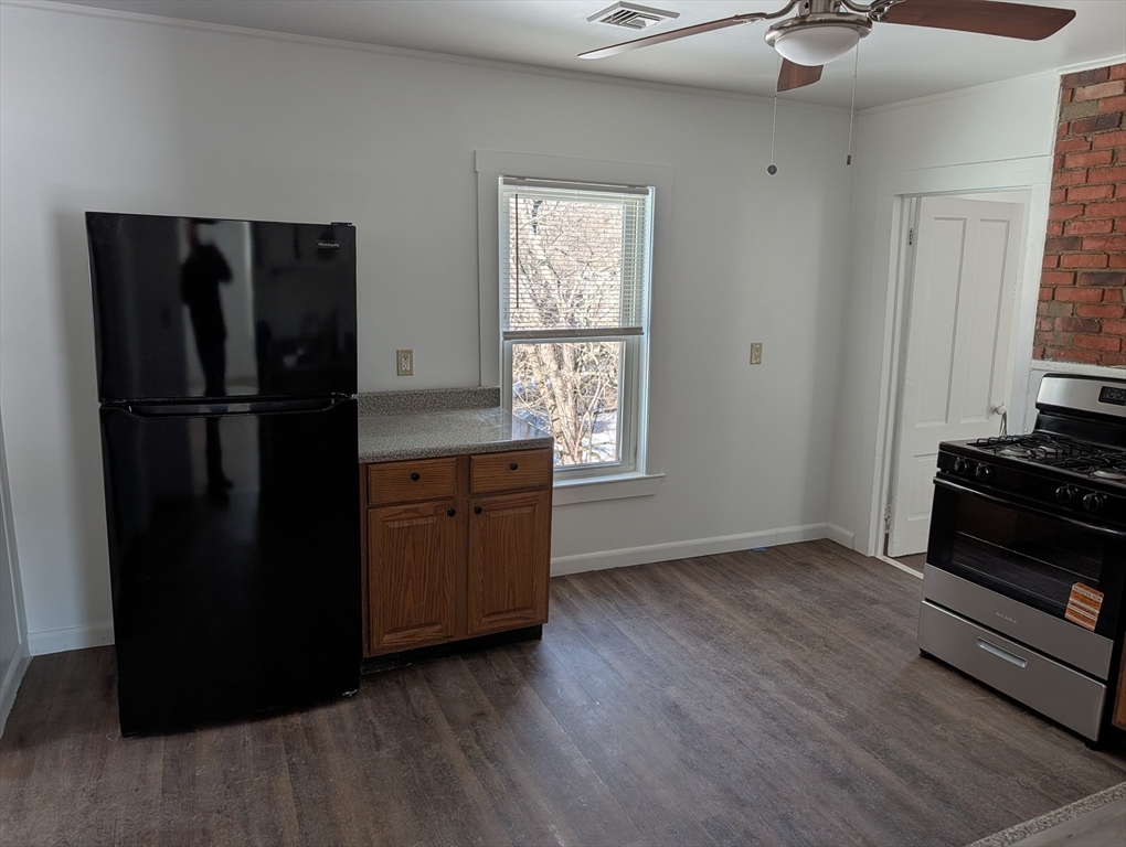 9 Turnpike Road, Unit 2 Montague, MA 01376 - Photo 4 of 21 a kitchen with a refrigerator and window