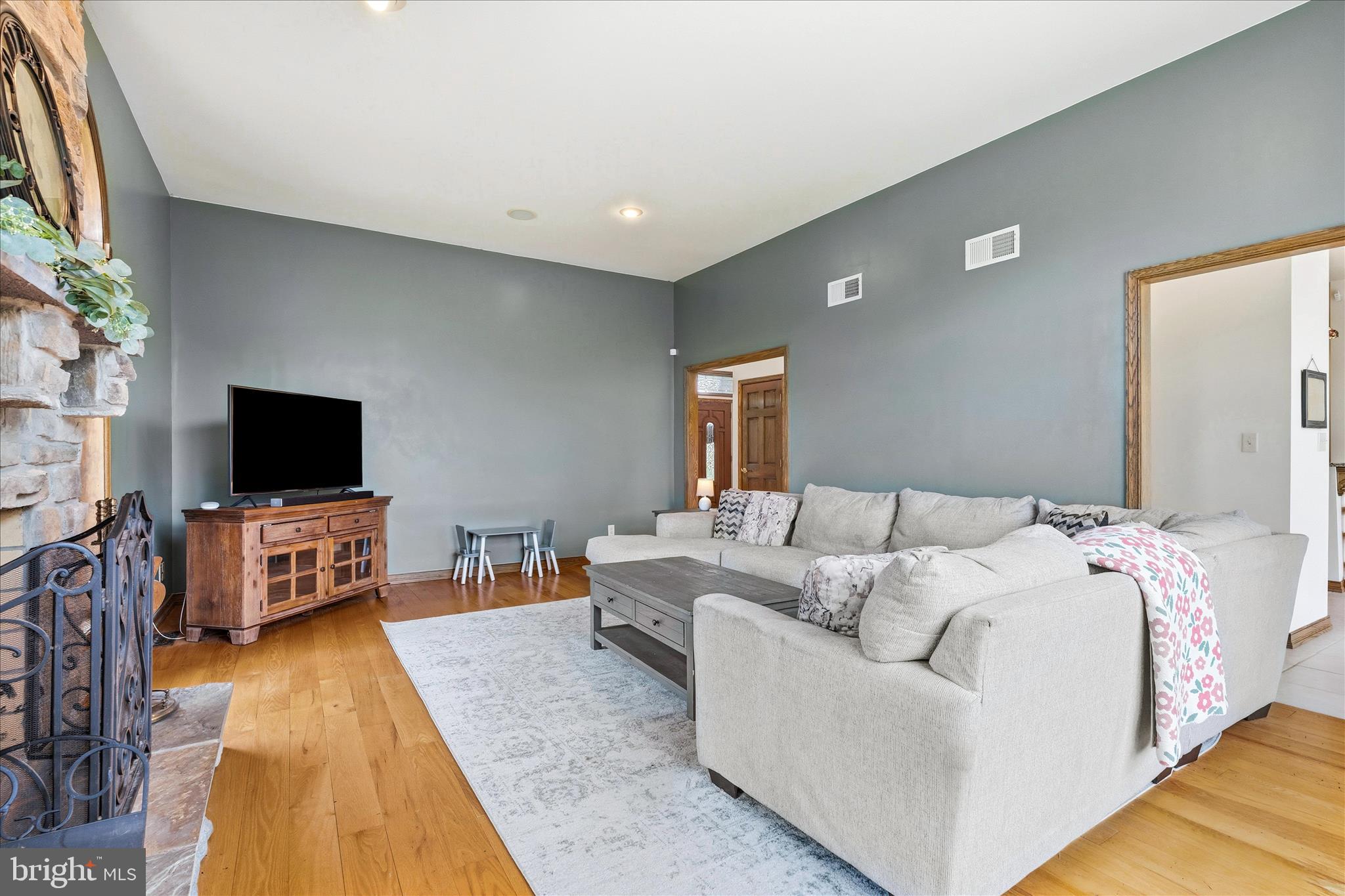 11820 Shimpstown Road Mercersburg, PA 17236 - Photo 12 of 75 a living room with furniture and a flat screen tv