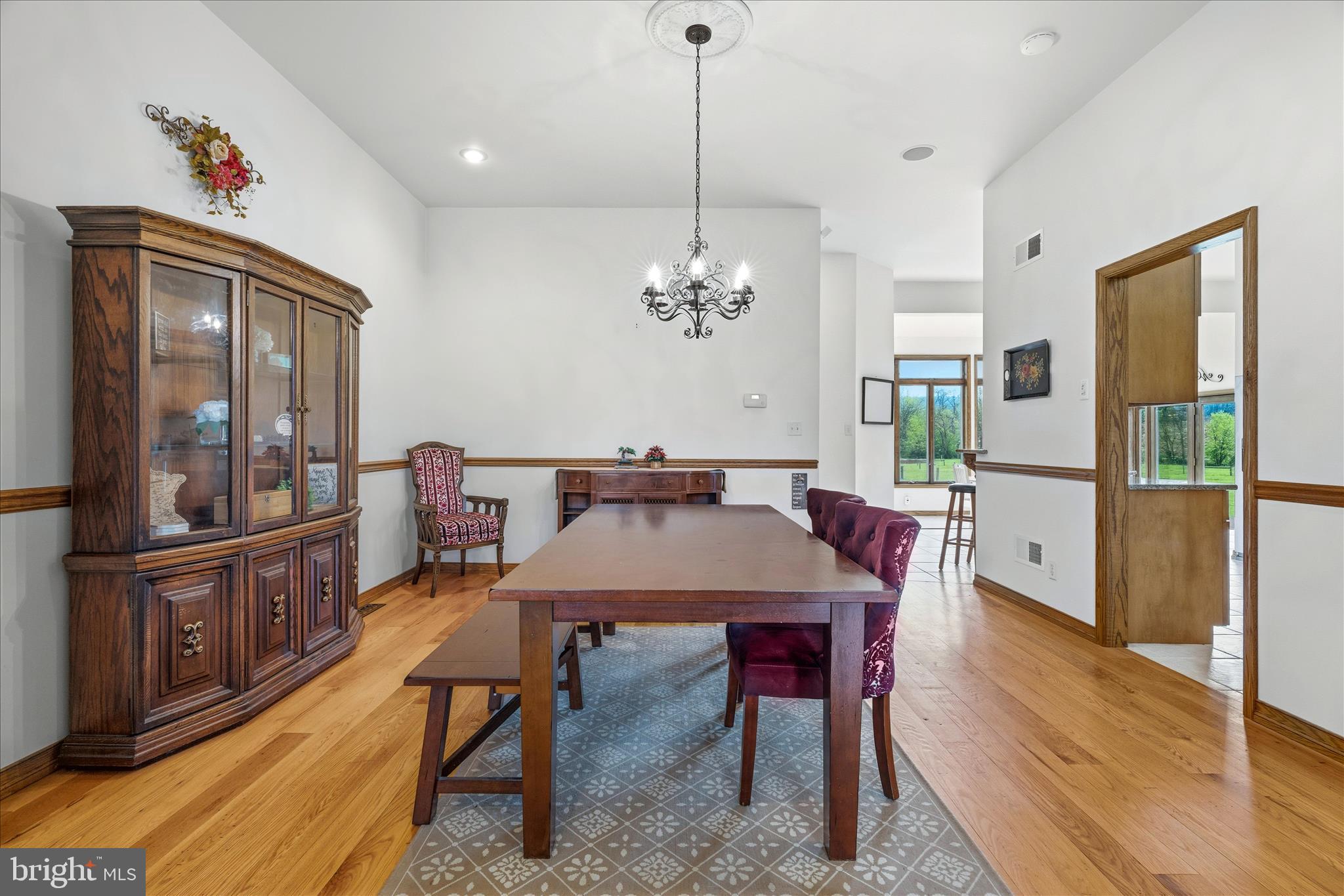 11820 Shimpstown Road Mercersburg, PA 17236 - Photo 22 of 75 a view of a dining room with furniture window and wooden floor