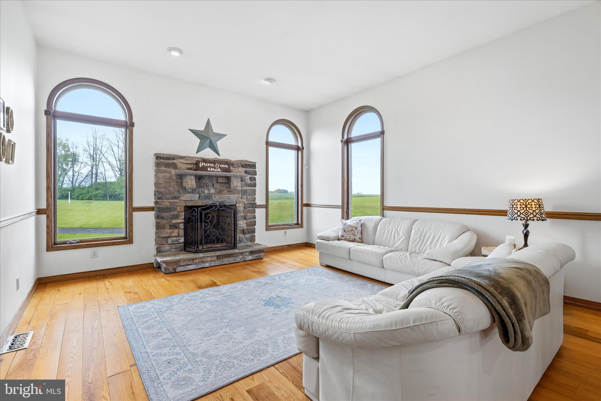 11820 Shimpstown Road Mercersburg, PA 17236 - Photo 24 of 75 a living room with furniture and a fireplace