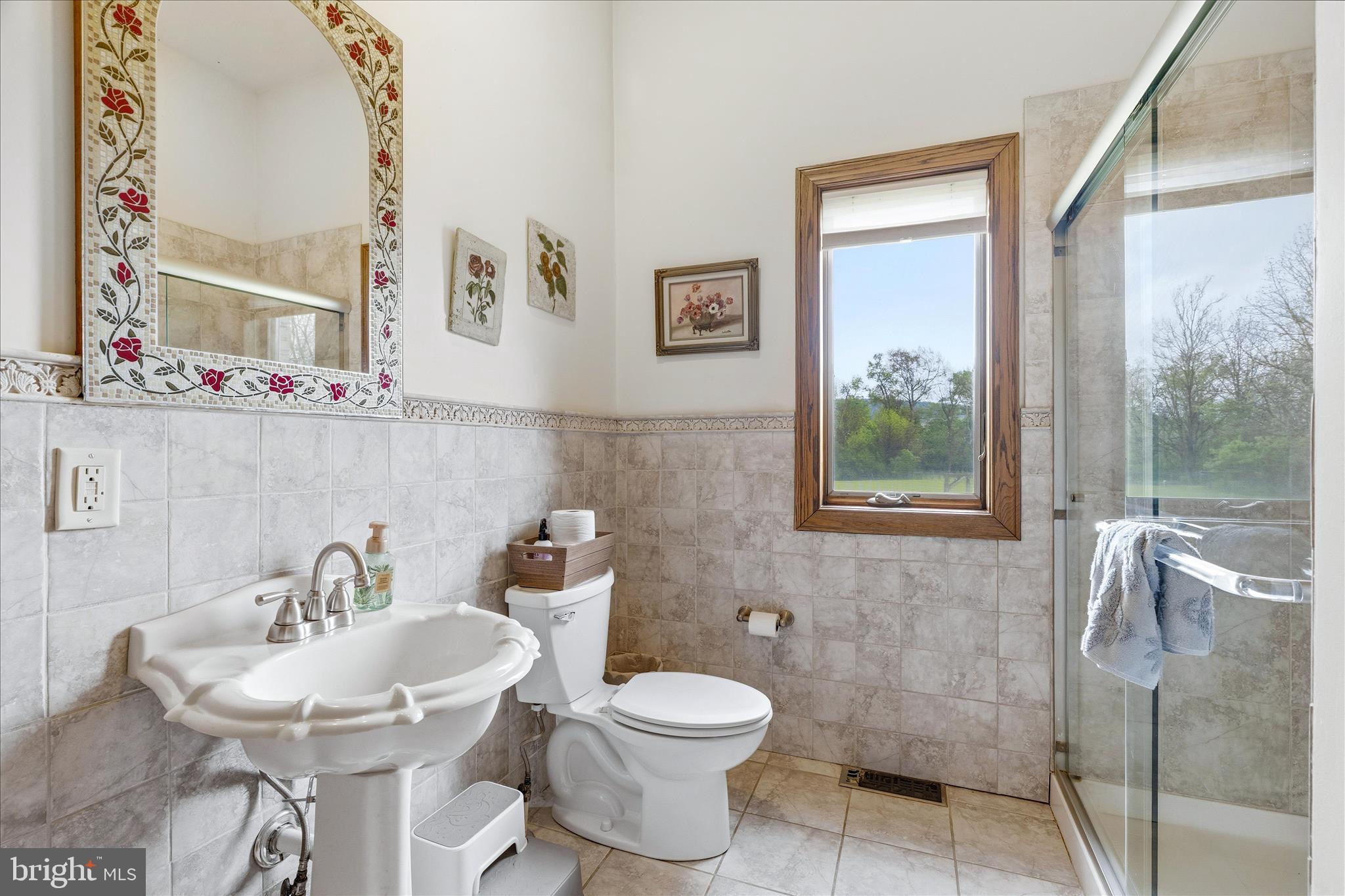 11820 Shimpstown Road Mercersburg, PA 17236 - Photo 27 of 75 a bathroom with a toilet a sink and a mirror