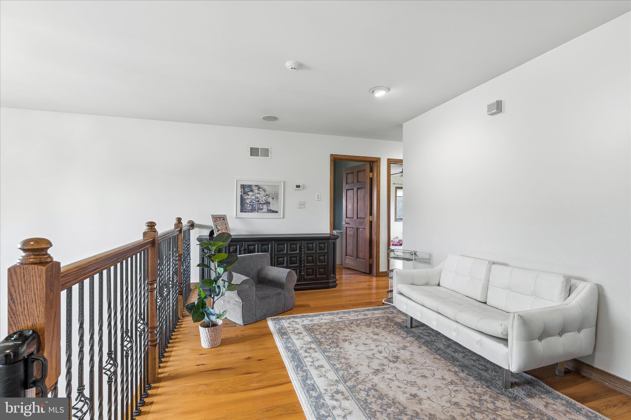 11820 Shimpstown Road Mercersburg, PA 17236 - Photo 30 of 75 a living room with furniture and a rug