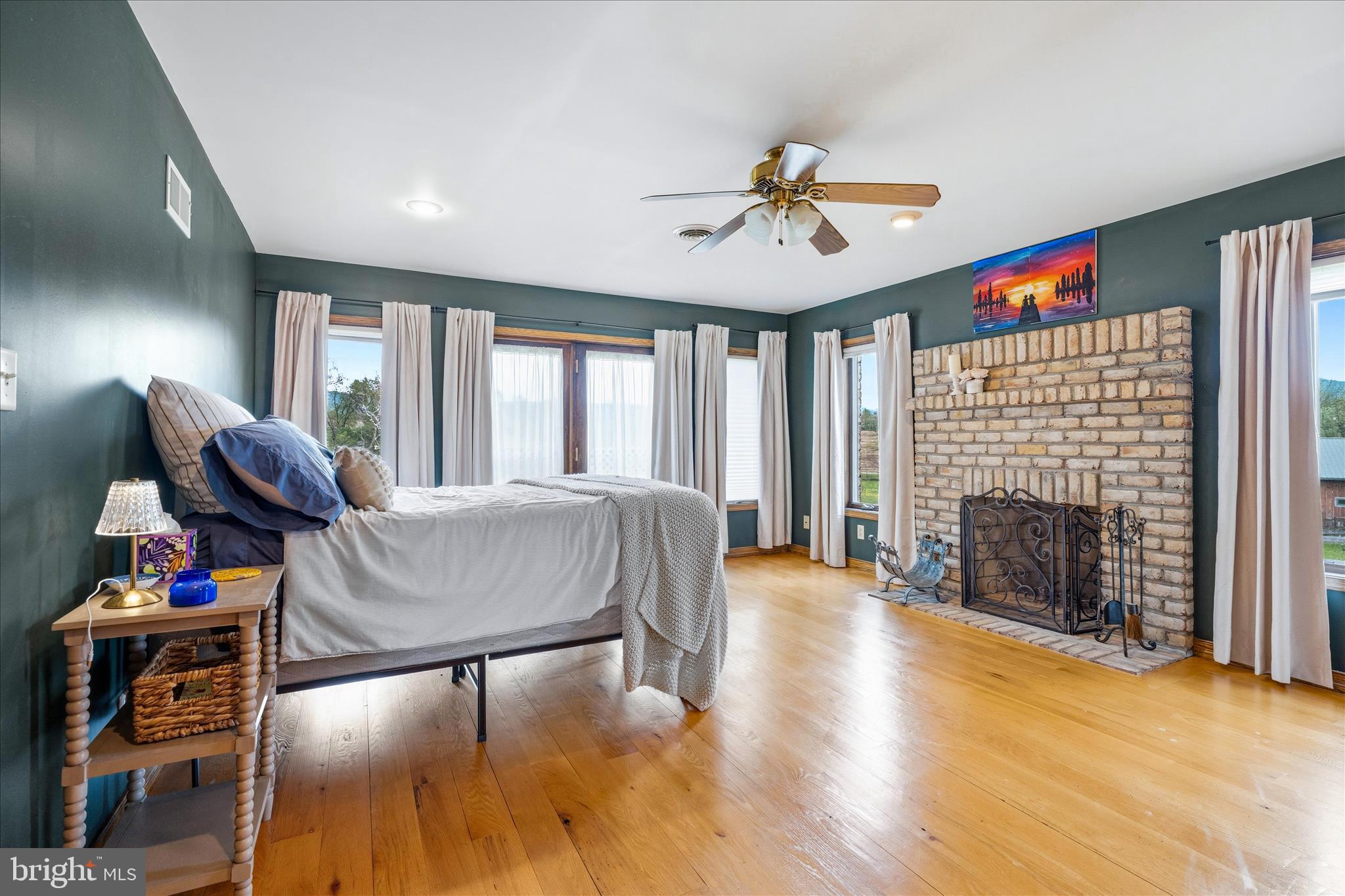 11820 Shimpstown Road Mercersburg, PA 17236 - Photo 31 of 75 a living room with furniture and a fireplace