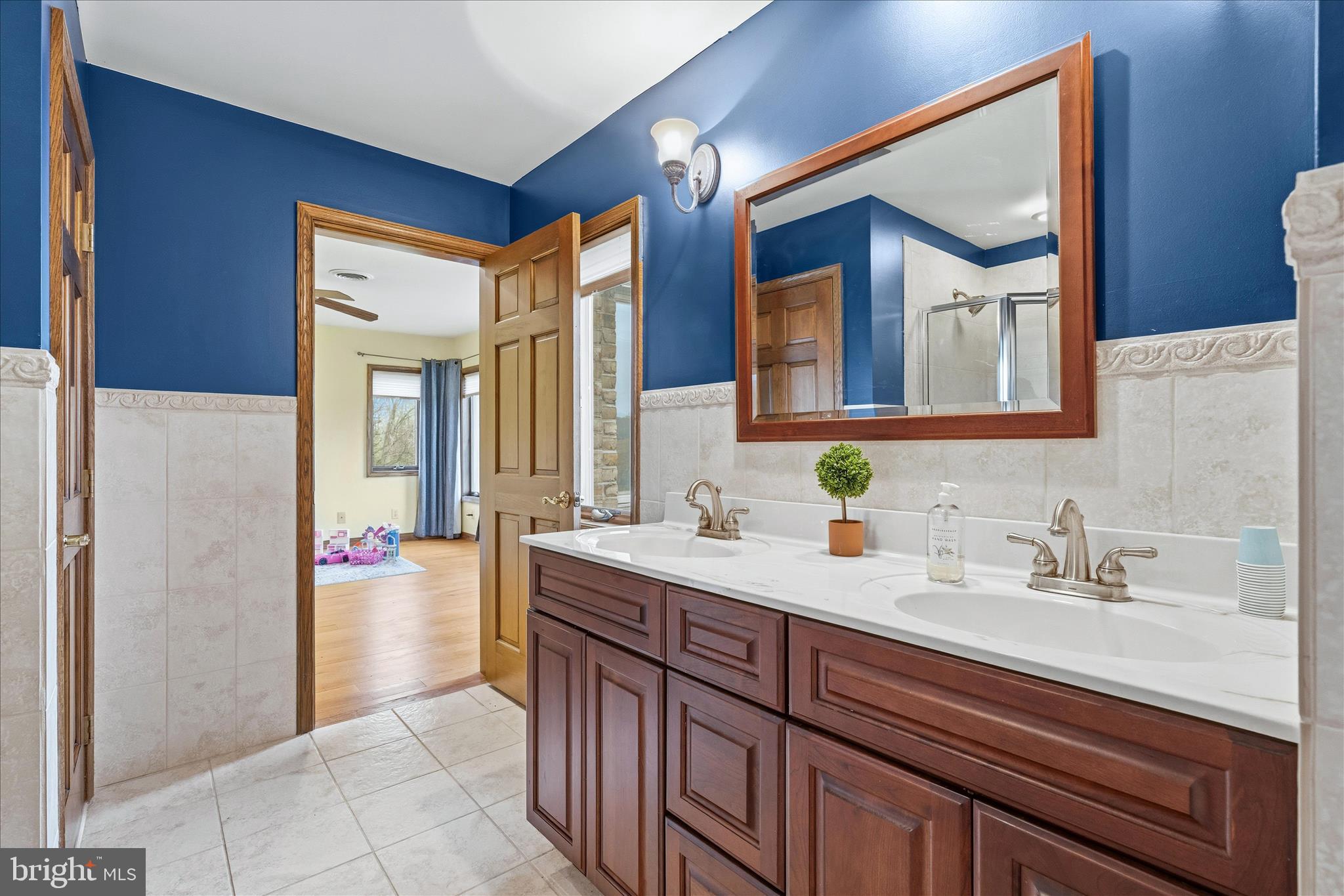 11820 Shimpstown Road Mercersburg, PA 17236 - Photo 39 of 75 a bathroom with a sink and a mirror