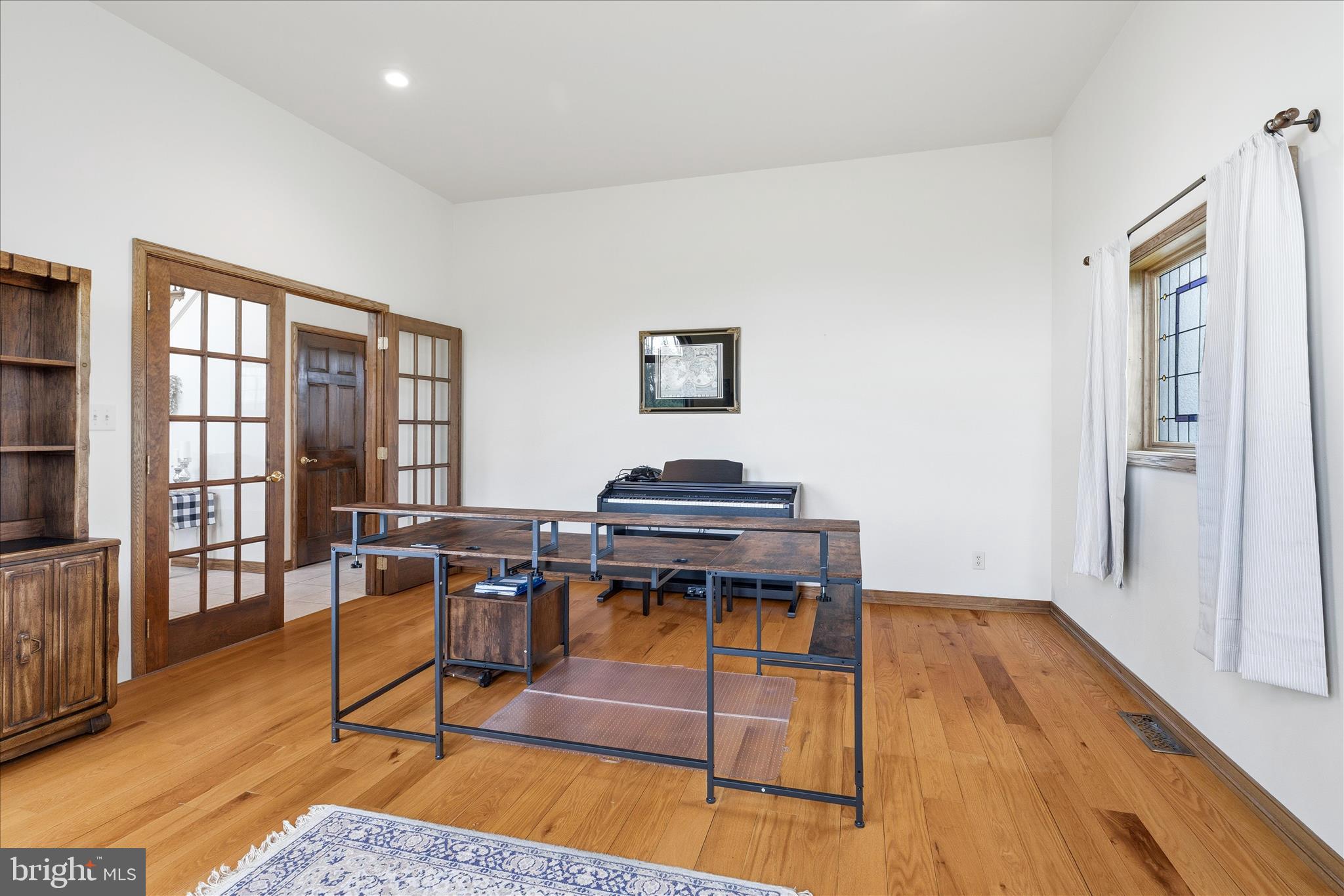11820 Shimpstown Road Mercersburg, PA 17236 - Photo 8 of 75 a workspace with furniture window and wooden floor