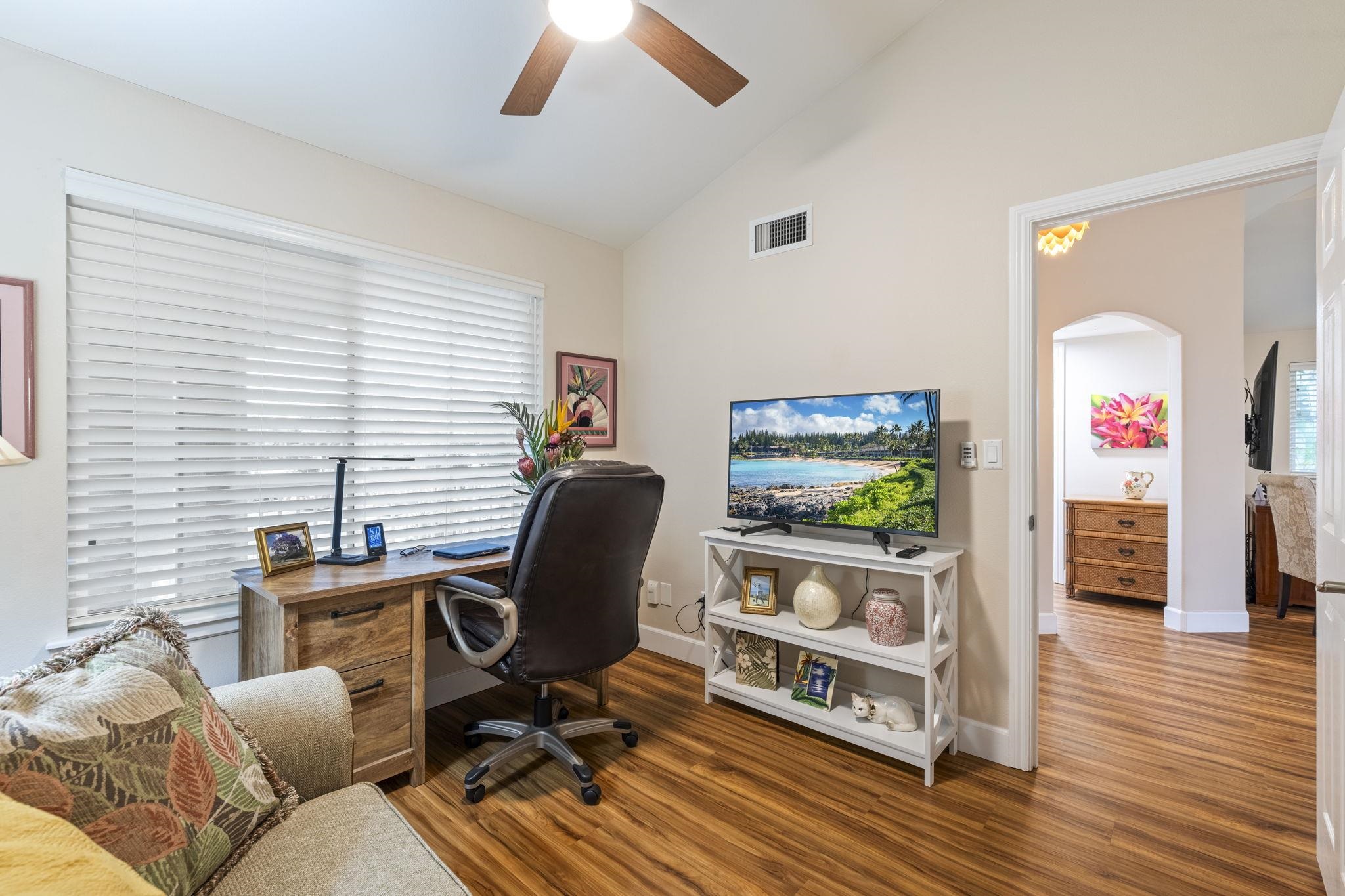 16 Kai Makani Loop, Unit D201 Kihei, HI 96753 - Photo 29 of 50 a view of a workspace with furniture and wooden floor