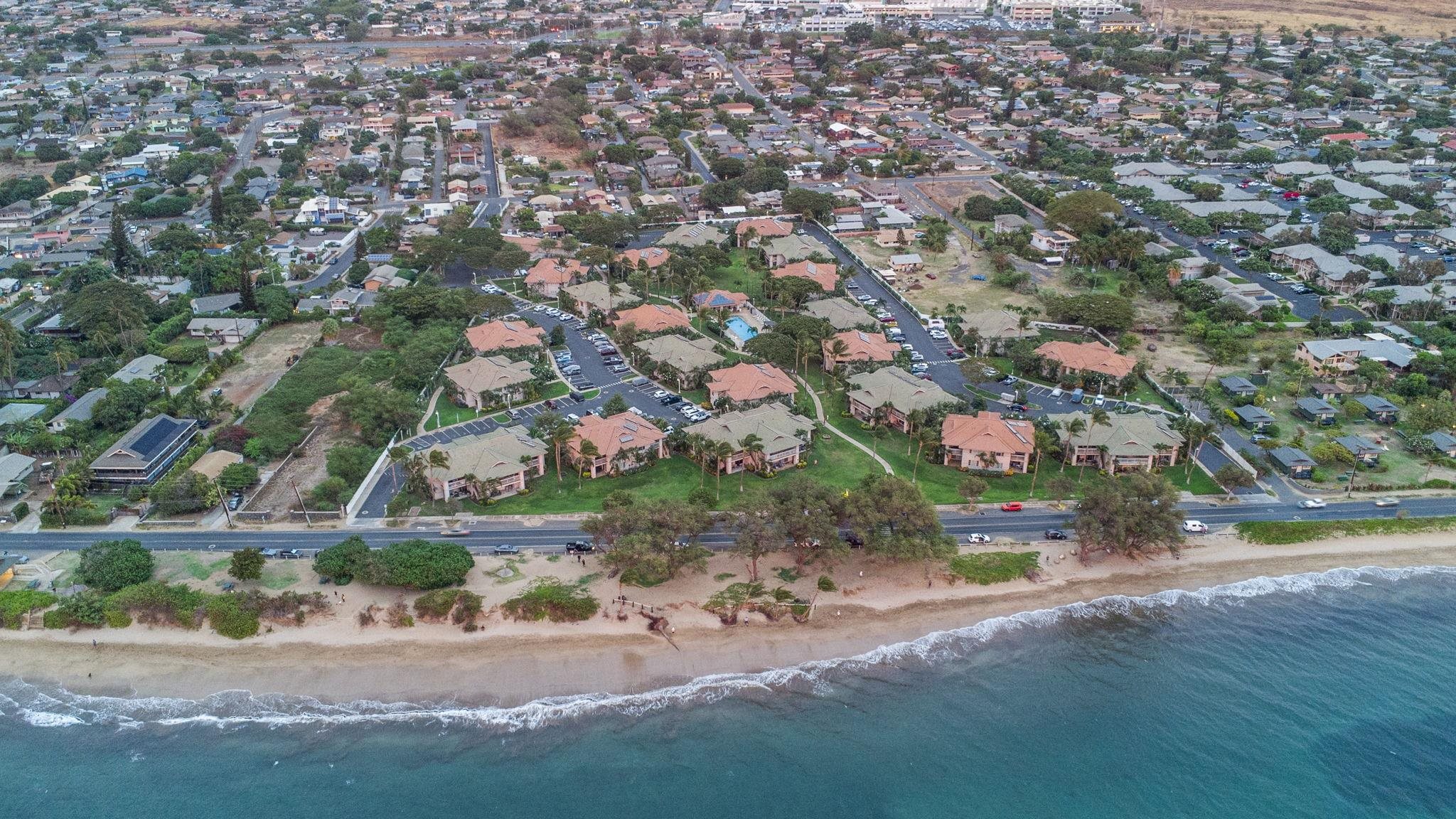 16 Kai Makani Loop, Unit D201 Kihei, HI 96753 - Photo 43 of 50 an aerial view of a houses with yard