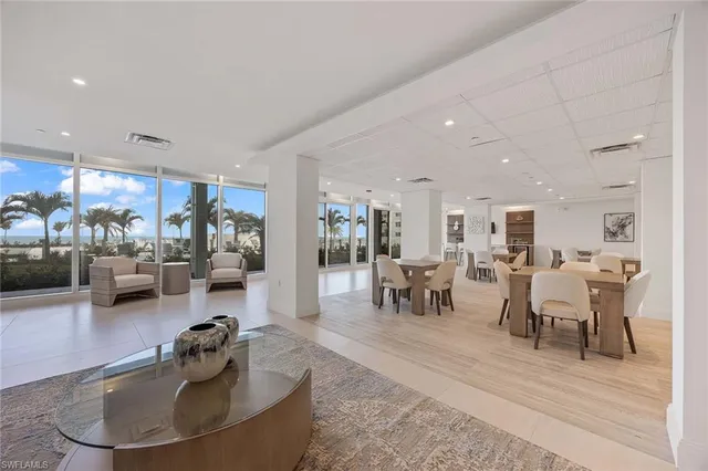 a living room with furniture and a table